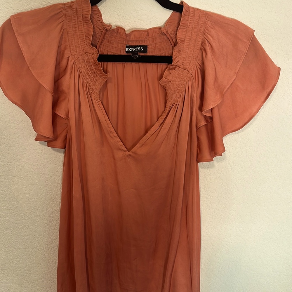 Express Size Medium Fall Orange blouse with ruffled arm accent. Burnt orangesilk